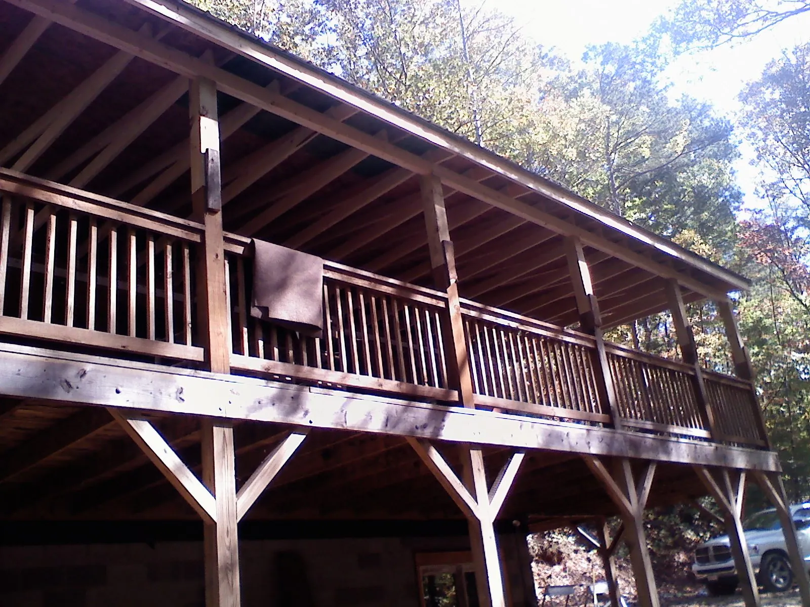 Timber framing under a new elevated porch and deck — Roof Leak Repair in Ronda by Roofing Brothers